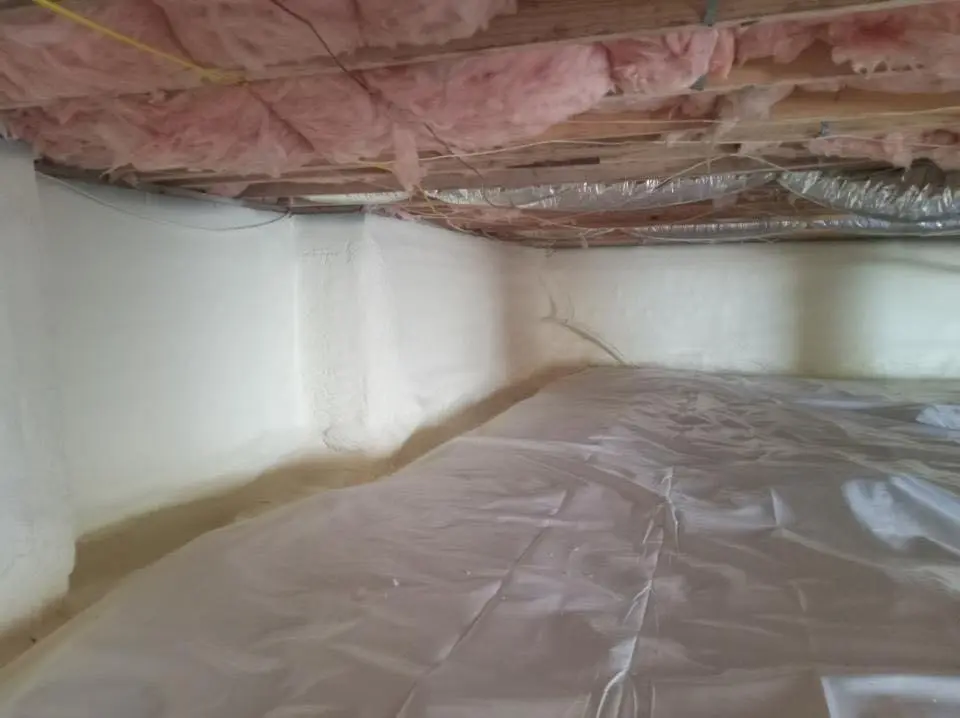 Crawl space encapsulation with closed-cell spray foam for Commercial Roof Restoration in Skaneateles